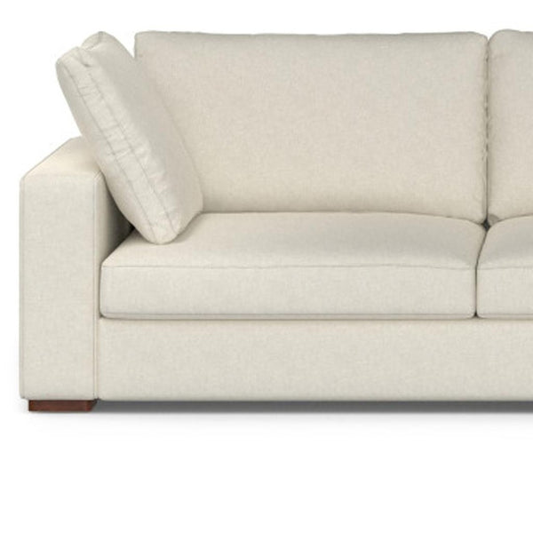 HomeRoots 122" Cream Fabric Sofa - Modern L-Shaped Sectional with Tufted Design & Brown Legs for Comfort 641044