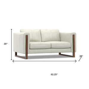 HomeRoots 62" Gray Leather Sofa – Modern Design with Walnut Legs, Plush Seating for 2, and Easy Maintenance 641136