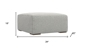 34 Inch Upholstered Fabric Cocktail Ottoman for Living Room Neutral Tone Accent Piece