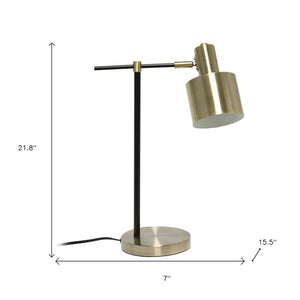 HomeRoots 22" Stylish Antiqued Brass and Black Metal Table Lamp with Globe Shade for Modern Elegance 643429