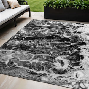 HomeRoots 5' X 8' Black And Ivory Abstract Indoor Outdoor Area Rug - Stylish, Washable, Durable for High-Traffic Spaces 643524