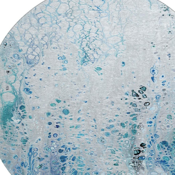 HomeRoots 8' Light Blue and Ivory Round Area Rug - Durable Abstract Design, Washable for Indoor & Outdoor Use 643549