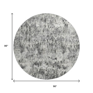 HomeRoots 8' Round Abstract Area Rug in Gray, Brown & Ivory - Washable, Indoor/Outdoor, Stylish & Durable 643585