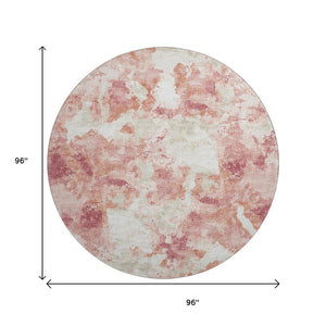 HomeRoots 8' Pink and Ivory Round Abstract Washable Rug - Versatile Indoor/Outdoor Design with Non-Slip Backing 643603