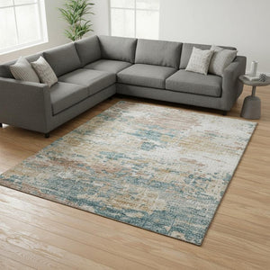 HomeRoots 8' X 10' Teal Blue Ivory Copper Abstract Area Rug - Durable, Washable, Pet-Friendly & UV Protected! 643729