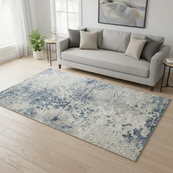 HomeRoots 5' X 8' Blue and Ivory Abstract Area Rug - Washable, Stain Resistant, UV Protected for Modern Homes 643763