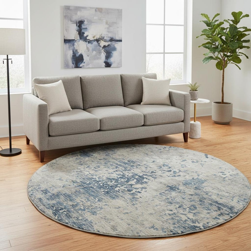 HomeRoots 8' Blue and Ivory Abstract Round Rug - Washable, UV Protected, Durable Design for Busy Homes 643764