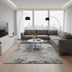HomeRoots 9' X 12' Blue And Ivory Abstract Area Rug - Washable, UV Protected, Stylish for High-Traffic Spaces 643766