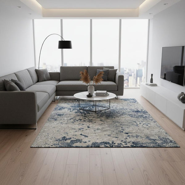 HomeRoots 10' X 14' Blue and Ivory Abstract Area Rug - Washable, UV Protected, Perfect for High-Traffic Spaces! 643767