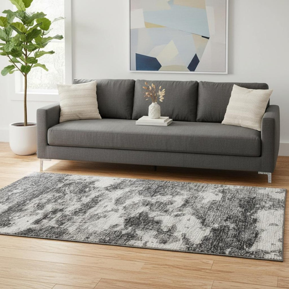HomeRoots 5' X 8' Black And Ivory Abstract Washable Area Rug – Stylish, Durable, UV-Protected for Modern Homes 643787