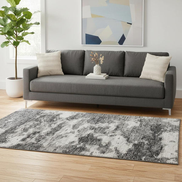 HomeRoots 5' X 8' Black And Ivory Abstract Washable Area Rug – Stylish, Durable, UV-Protected for Modern Homes 643787