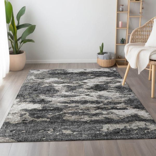 HomeRoots 8' X 10' Black And Ivory Abstract Area Rug - Washable, UV-Protected, Stylish for High-Traffic Spaces 643789