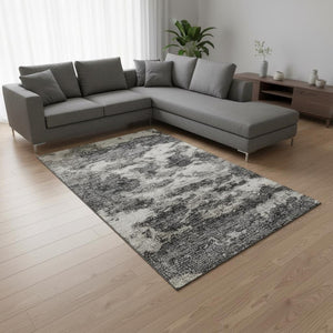 HomeRoots 8' X 10' Black And Ivory Abstract Area Rug - Washable, UV-Protected, Stylish for High-Traffic Spaces 643789