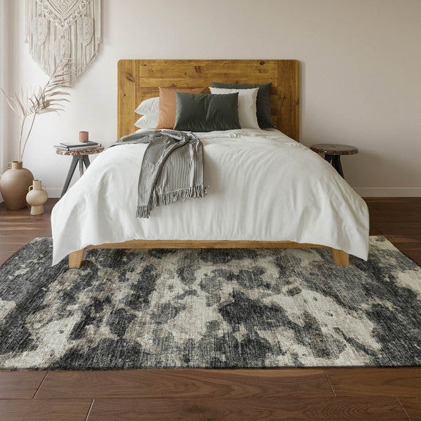 HomeRoots 8' X 10' Black And Ivory Abstract Area Rug - Washable, UV-Protected, Stylish for High-Traffic Spaces 643789