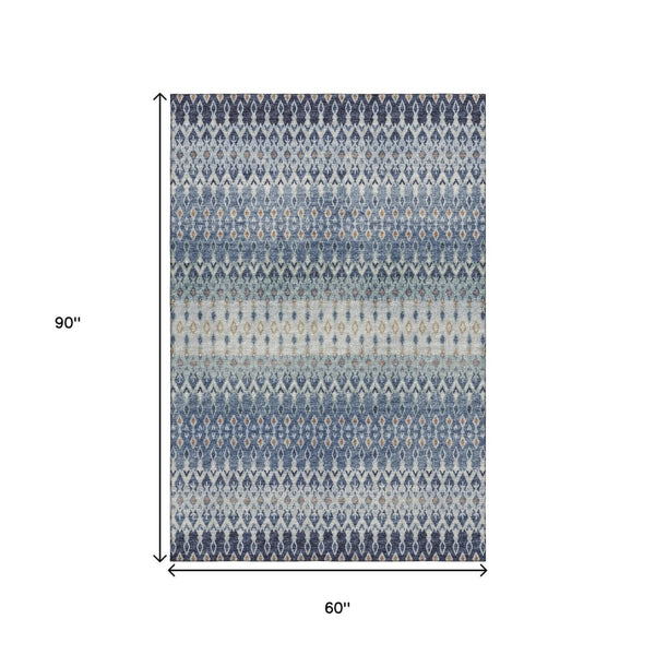 HomeRoots 5' X 8' Aqua Gray and Orange Tribal Area Rug - Washable, UV Protected, Stylish for Indoor & Outdoor Use! 643805