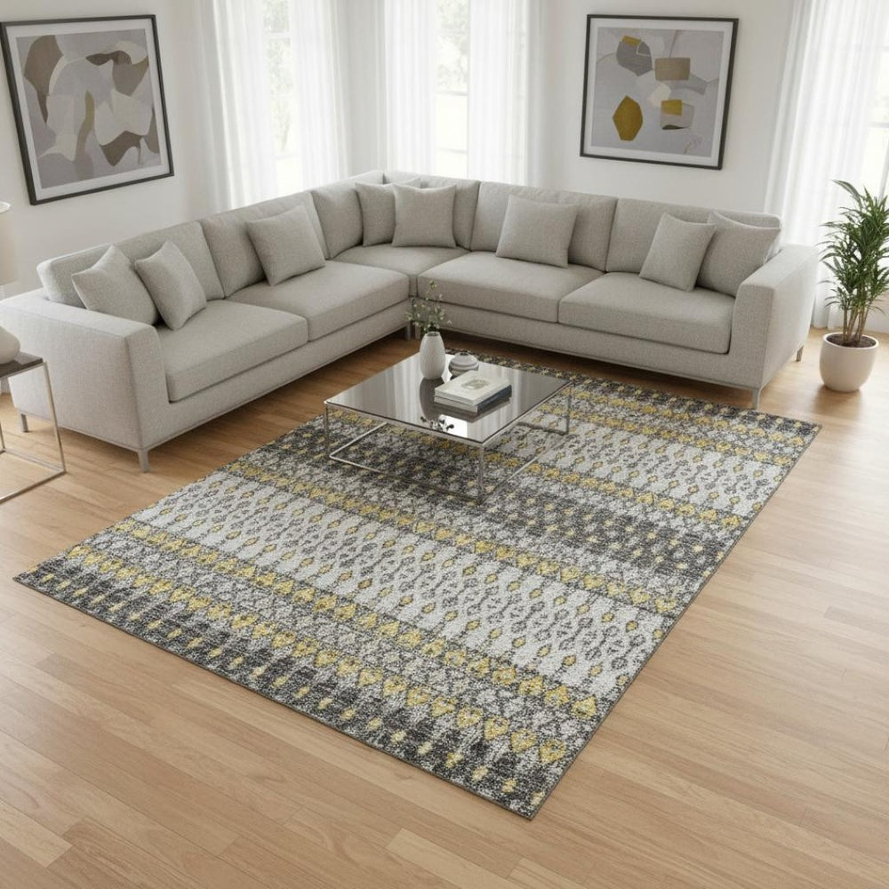 HomeRoots 8' X 10' Gray and Gold Tribal Area Rug - Durable, Washable, UV-Protected for High-Traffic Homes 643813
