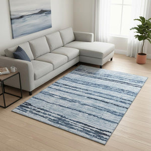 HomeRoots 9' X 12' Striped Blue and Ivory Washable Area Rug with UV Protection for High-Traffic Spaces 644046