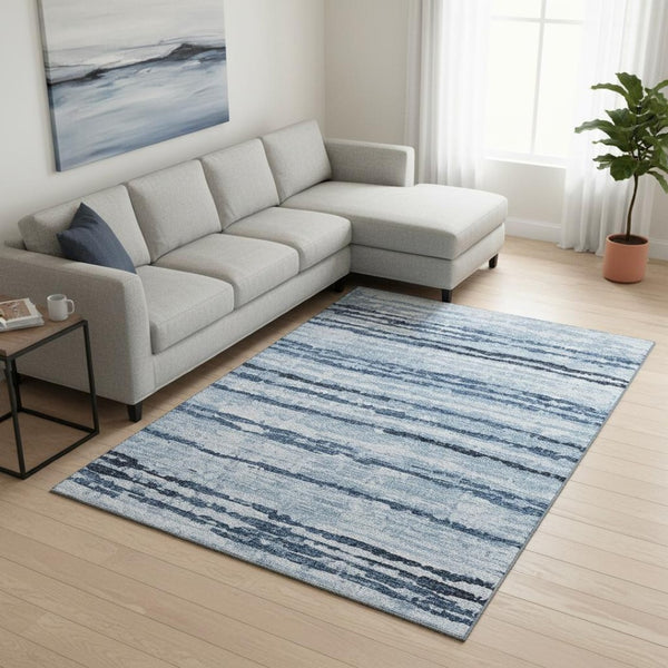HomeRoots 9' X 12' Striped Blue and Ivory Washable Area Rug with UV Protection for High-Traffic Spaces 644046