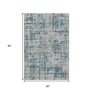 HomeRoots 5' X 8' Persian Blue and Gray Abstract Area Rug - Stylish, Washable, UV-Protected for Homes with Kids! 644055