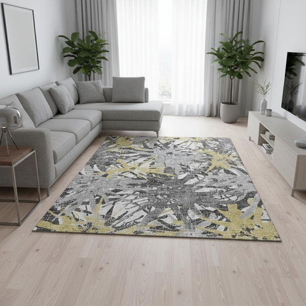 HomeRoots 10' X 14' Modern Abstract Area Rug in Gold, Gray & Charcoal - Washable, Stain-Resistant, UV Protected 644095