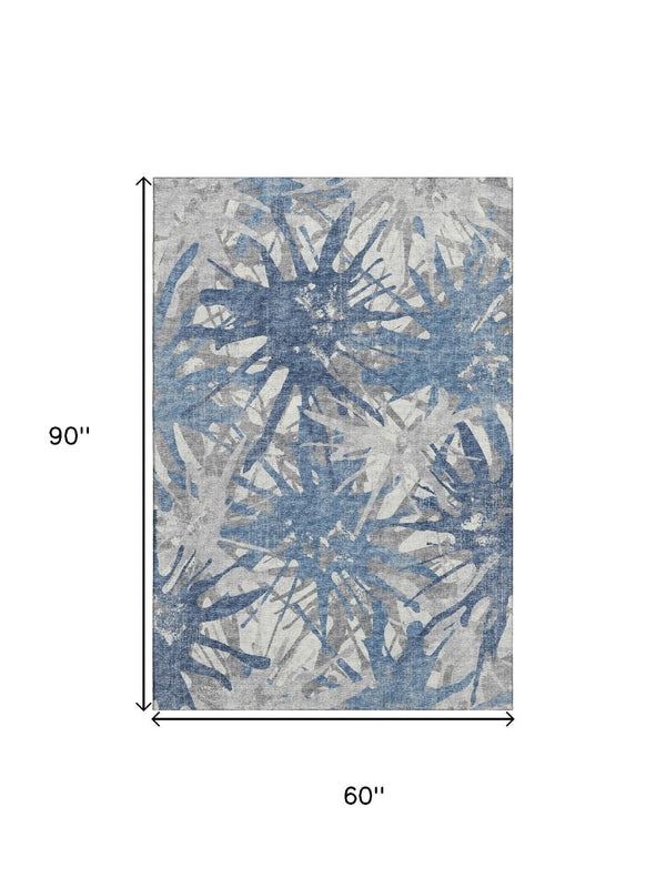 HomeRoots 5' X 8' Modern Blue Ivory Gray Abstract Area Rug - Washable, UV Protected & Stain Resistant Design 644103