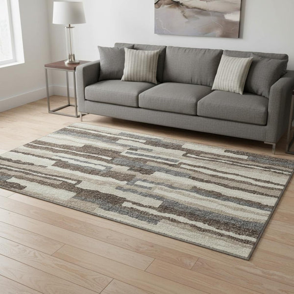 HomeRoots 5' X 8' Abstract Brown Ivory Gray Area Rug - Washable, UV-Protected, Stain-Resistant for Family Spaces 644128
