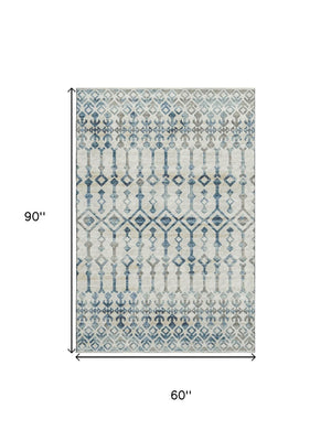 HomeRoots 5' X 8' Ivory and Blue Tribal Washable Area Rug - Durable, Stain-Resistant, UV Protected Design 644140
