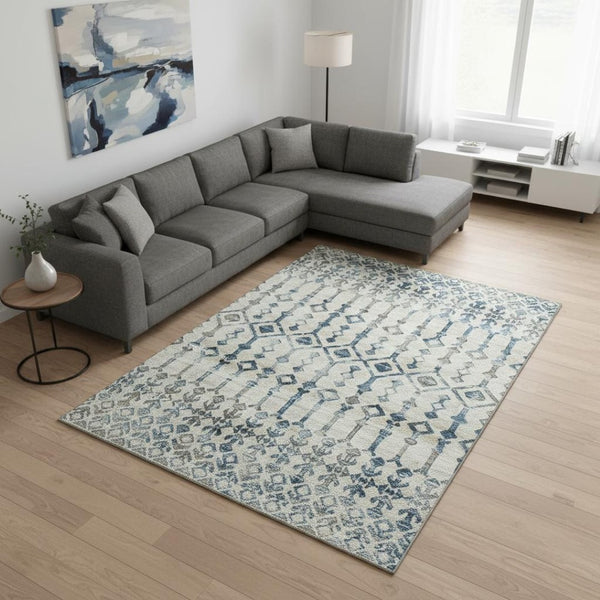 HomeRoots 9' X 12' Ivory and Blue Tribal Area Rug - Durable, Washable, UV-Protected for High-Traffic Spaces 644143