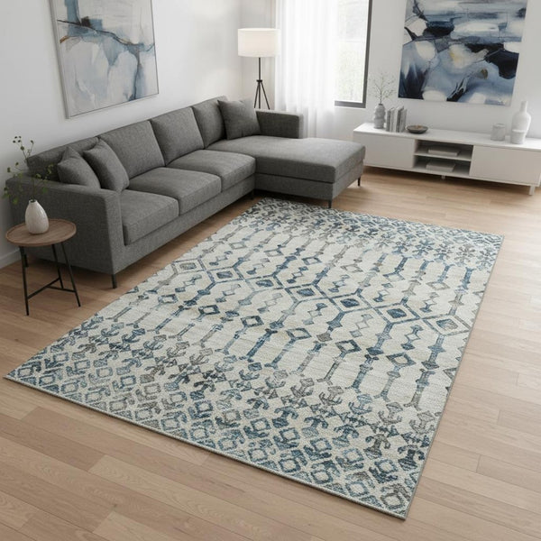 HomeRoots 10' X 14' Ivory and Blue Tribal Area Rug – Washable, Stain Resistant, UV Protected for Busy Homes 644144