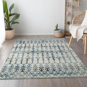 HomeRoots 10' X 14' Ivory and Blue Tribal Area Rug – Washable, Stain Resistant, UV Protected for Busy Homes 644144