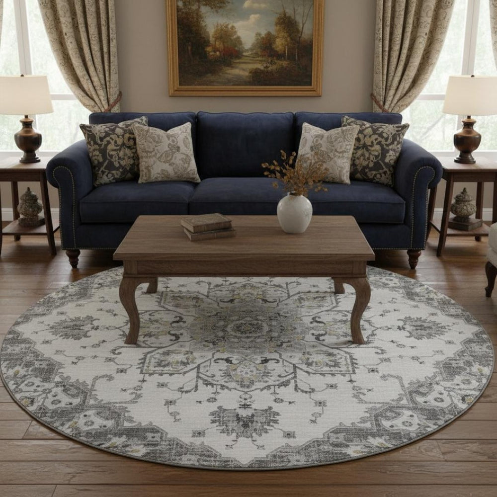HomeRoots 8' Light Gray Ivory & Gold Floral Medallion Round Rug - Washable, UV Protected & Stain Resistant! 644529