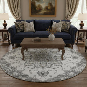 HomeRoots 8' Light Gray Ivory & Gold Floral Medallion Round Rug - Washable, UV Protected & Stain Resistant! 644529