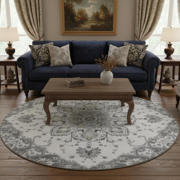HomeRoots 8' Light Gray Ivory & Gold Floral Medallion Round Rug - Washable, UV Protected & Stain Resistant! 644529