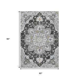 HomeRoots 5' X 8' Graphite Gold Charcoal Floral Medallion Area Rug - Washable, UV Protected, Stain Resistant! 644546
