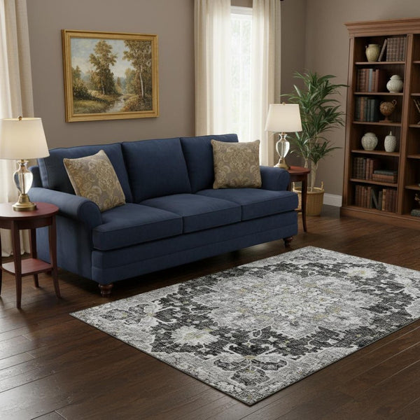 HomeRoots 5' X 8' Graphite Gold Charcoal Floral Medallion Area Rug - Washable, UV Protected, Stain Resistant! 644546