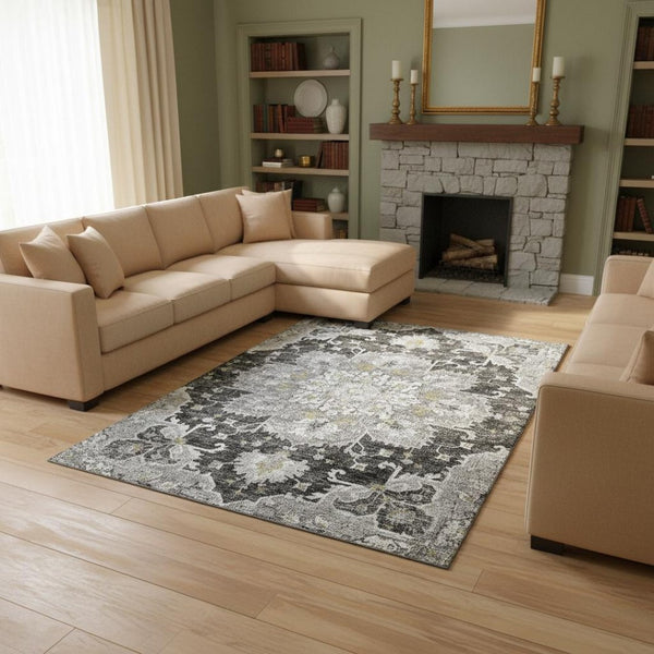 HomeRoots 9' X 12' Floral Medallion Area Rug in Graphite, Gold & Charcoal - Machine Washable & UV Resistant! 644549