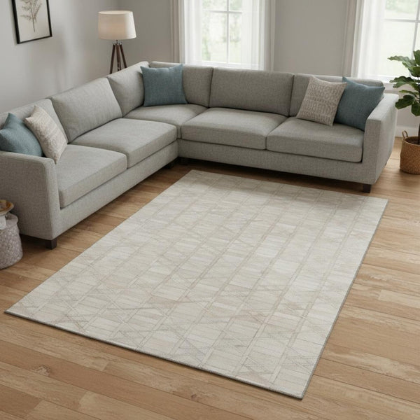 HomeRoots 10' Ivory and Beige Geometric Area Rug - Durable, Washable, UV-Protected for Busy Family Spaces 644664