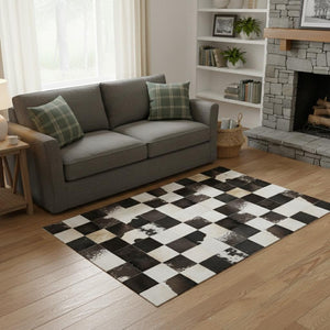 HomeRoots 5' X 8' Stylish Black Ivory Beige Patchwork Area Rug - Washable, UV-Protected, Pet-Friendly Design 644738