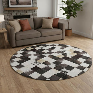 HomeRoots 8' Black Ivory and Beige Patchwork Round Rug – Washable, UV-Protected, Durable, Stylish Home Essential 644739