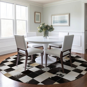 HomeRoots 8' Black Ivory and Beige Patchwork Round Rug – Washable, UV-Protected, Durable, Stylish Home Essential 644739