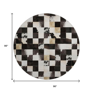 HomeRoots 8' Black Ivory and Beige Patchwork Round Rug – Washable, UV-Protected, Durable, Stylish Home Essential 644739
