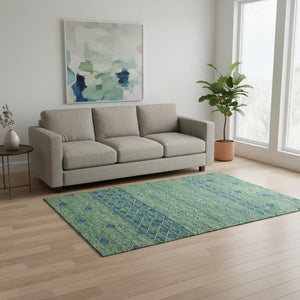 HomeRoots 5' X 8' Modern Geometric Washable Area Rug in Green & Navy - Durable, UV-Protected, Easy-Care Design 644762