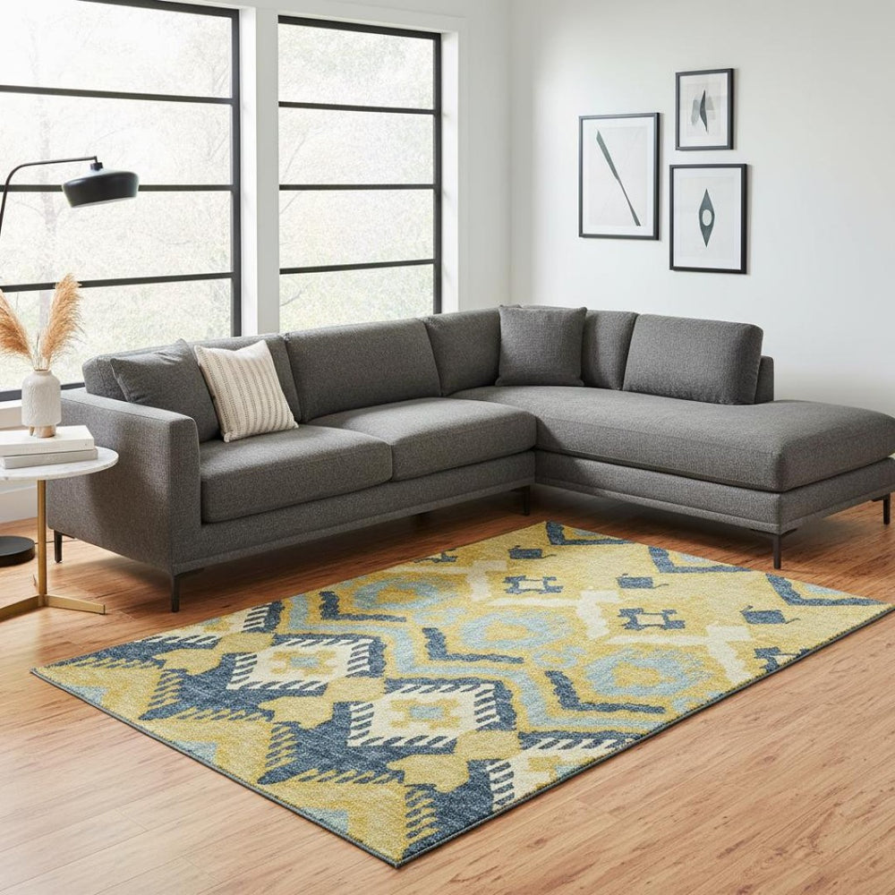 HomeRoots 9' X 12' Vibrant Yellow Ivory & Navy Blue Tribal Washable Area Rug with UV Protection & Durability 644783