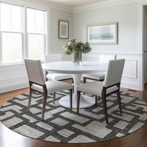 HomeRoots 8' Gray and Ivory Abstract Round Rug - Washable, UV Protected, Family-Friendly Style for Any Space 644841
