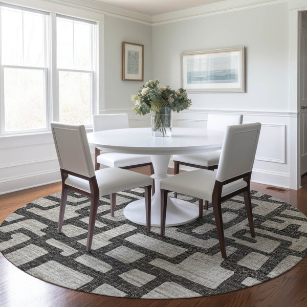 HomeRoots 8' Gray and Ivory Abstract Round Rug - Washable, UV Protected, Family-Friendly Style for Any Space 644841