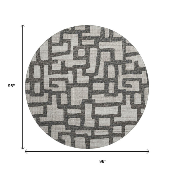 HomeRoots 8' Gray and Ivory Abstract Round Rug - Washable, UV Protected, Family-Friendly Style for Any Space 644841