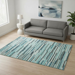 HomeRoots 5' X 8' Modern Abstract Area Rug in Turquoise Teal Blue & Gray - Washable with UV Protection! 644930