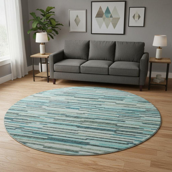 HomeRoots 8' Modern Abstract Round Rug in Turquoise and Gray - Durable, Washable, UV-Protected for Families 644931