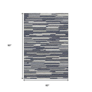 HomeRoots 5' X 8' Washable Gray Charcoal & Ivory Abstract Area Rug with UV Protection for Modern Spaces 644936
