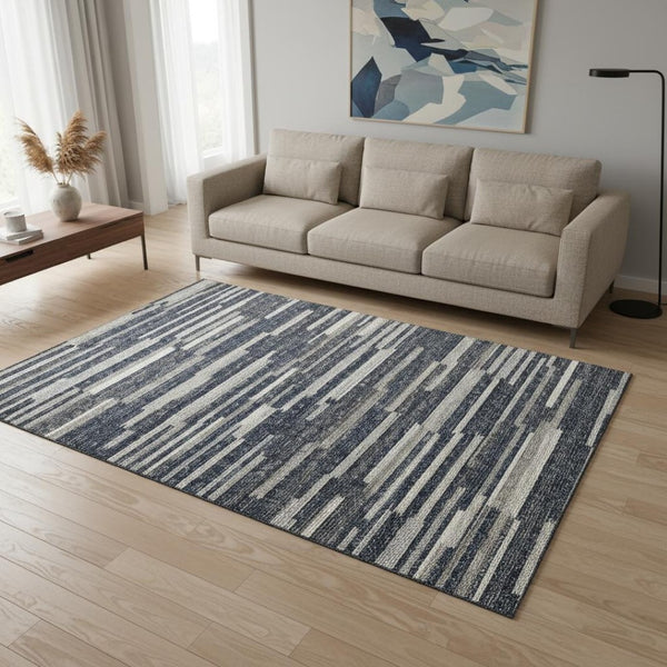 HomeRoots 5' X 8' Washable Gray Charcoal & Ivory Abstract Area Rug with UV Protection for Modern Spaces 644936